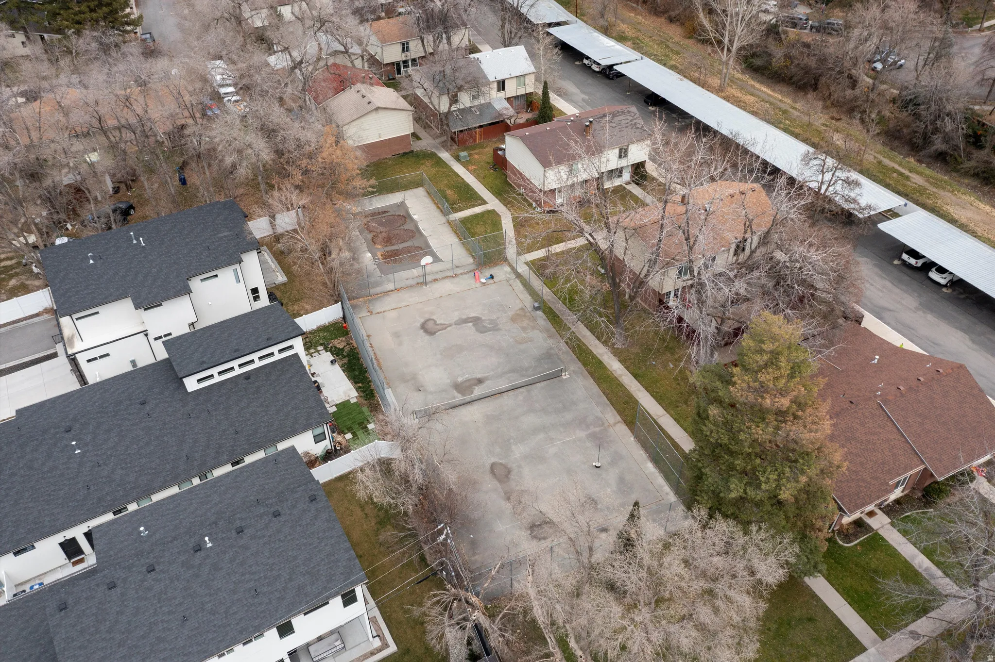 Aerial overview of property's location with nearby suburban area