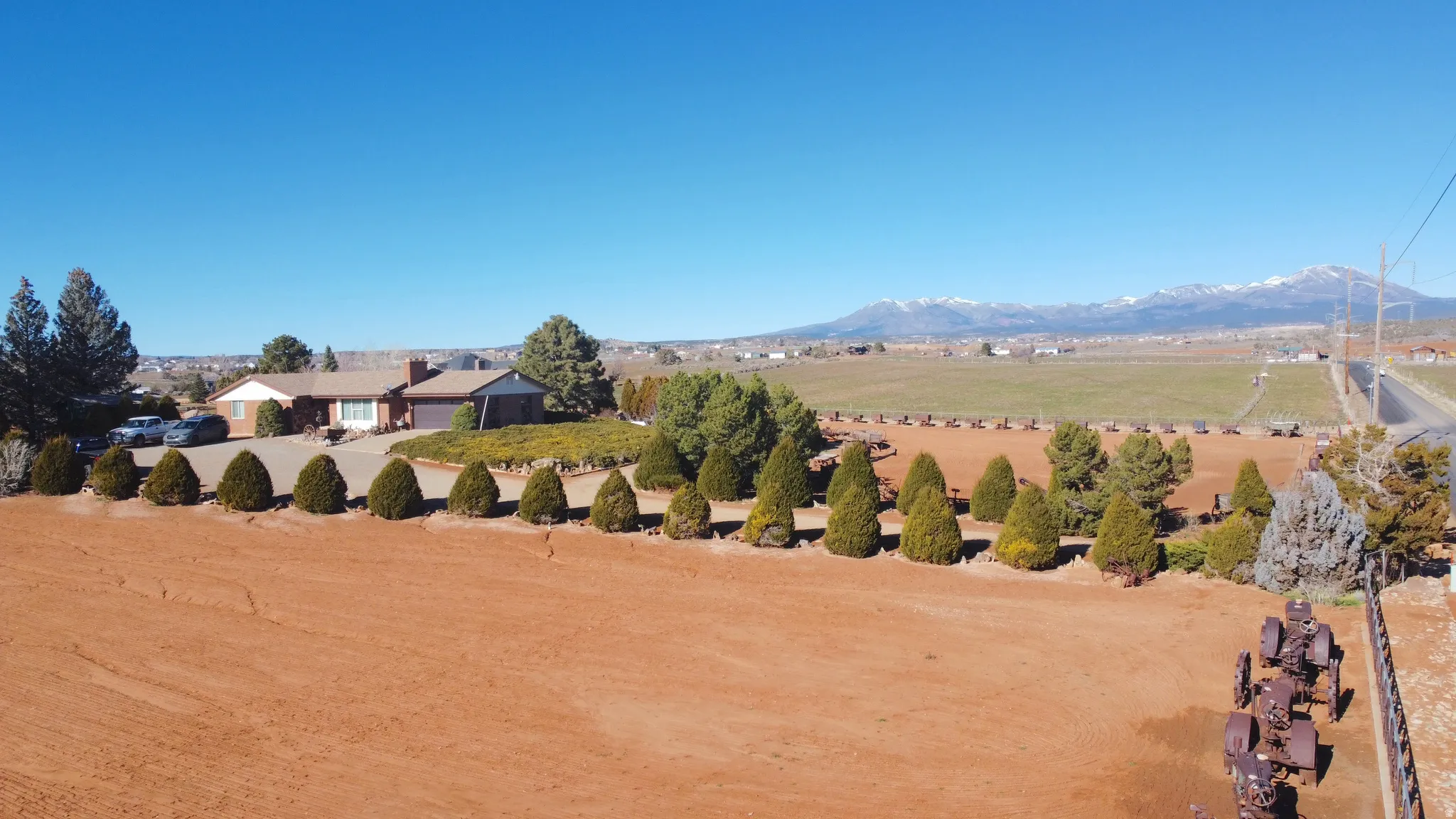 View of mountain backdrop featuring rural landscape