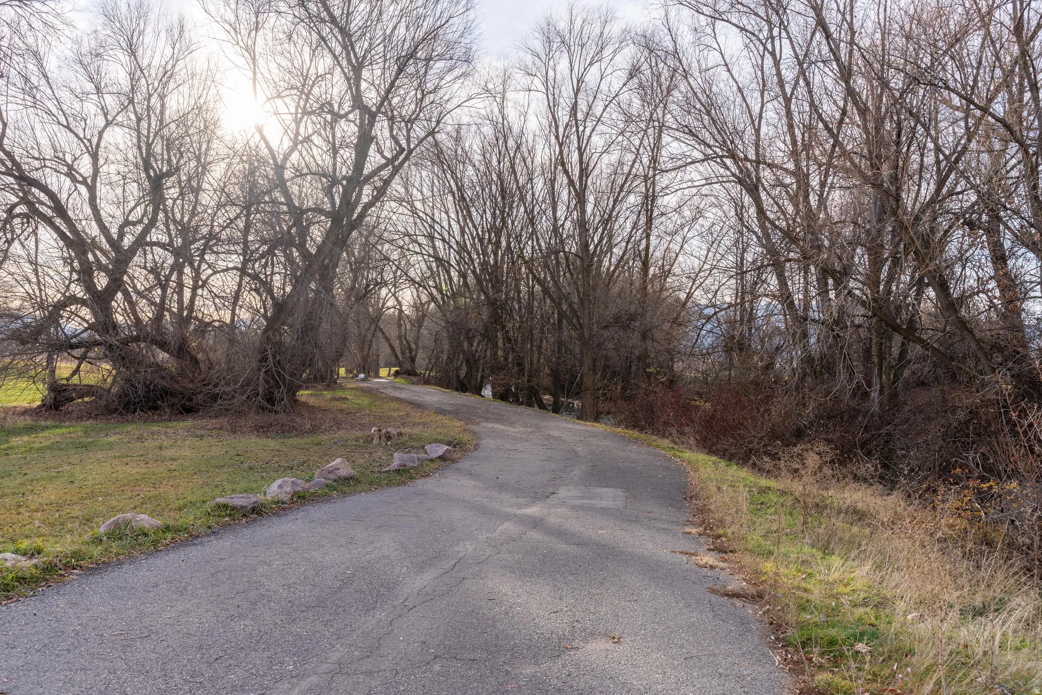 The wide two lane paved pathway facilitates cycling, for River Crossing Residents.