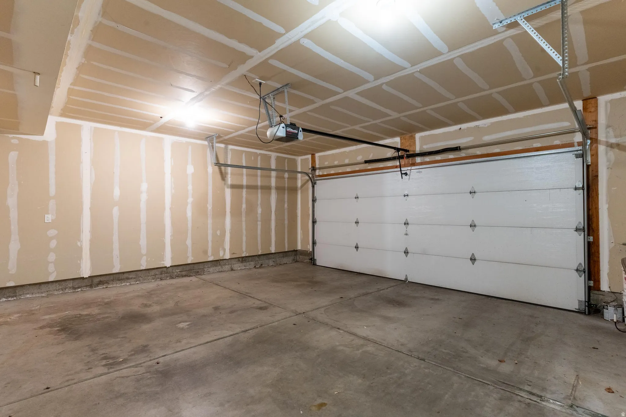 Spacious garage allows direct interior access to the kitchen door.