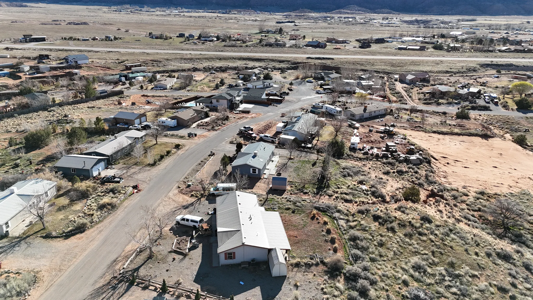 View of property location with nearby suburban area and a desert landscape