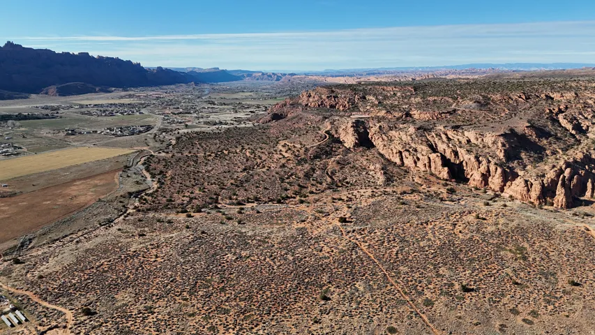 View of mountain backdrop featuring a desert landscape and rural landscape