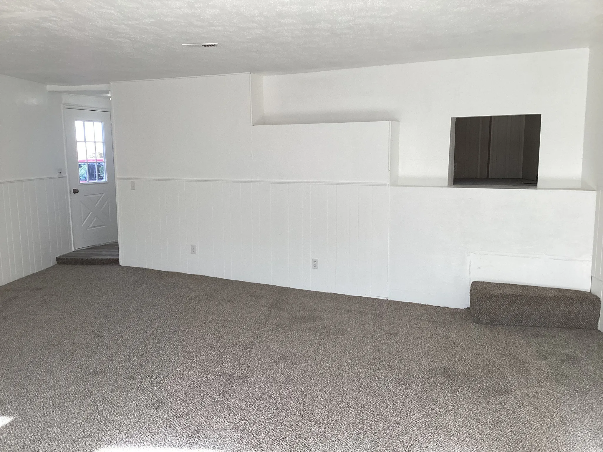 Living room with a secret hideaway for the kids to play in