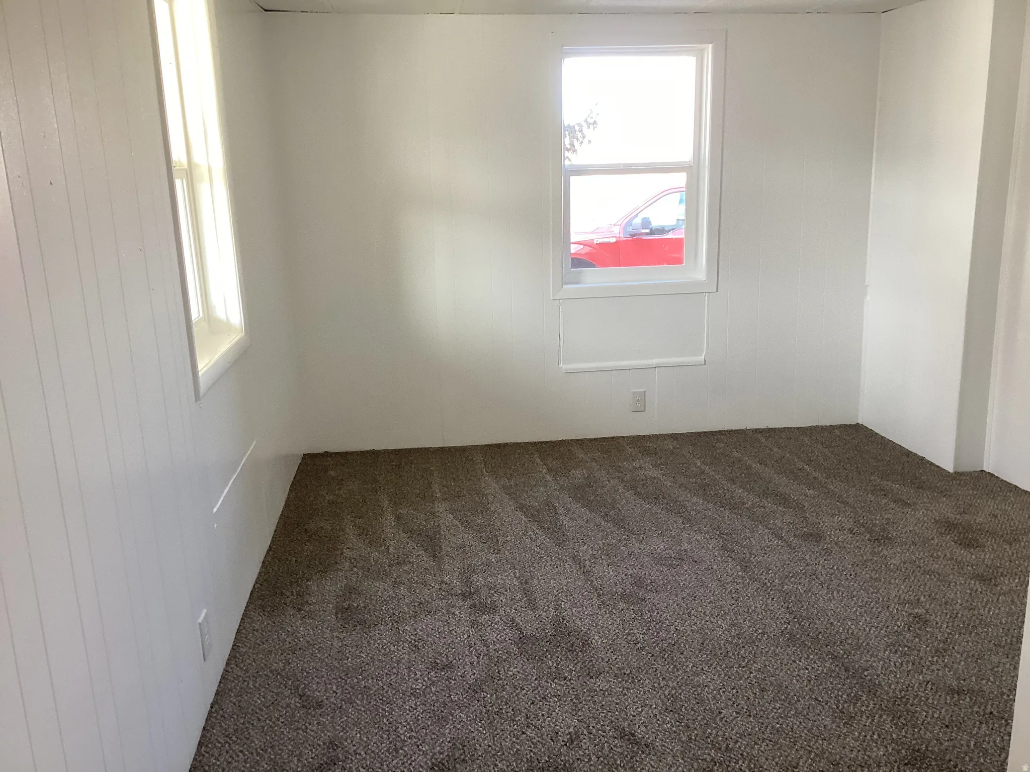 Loft bedroom with storage and a closet
