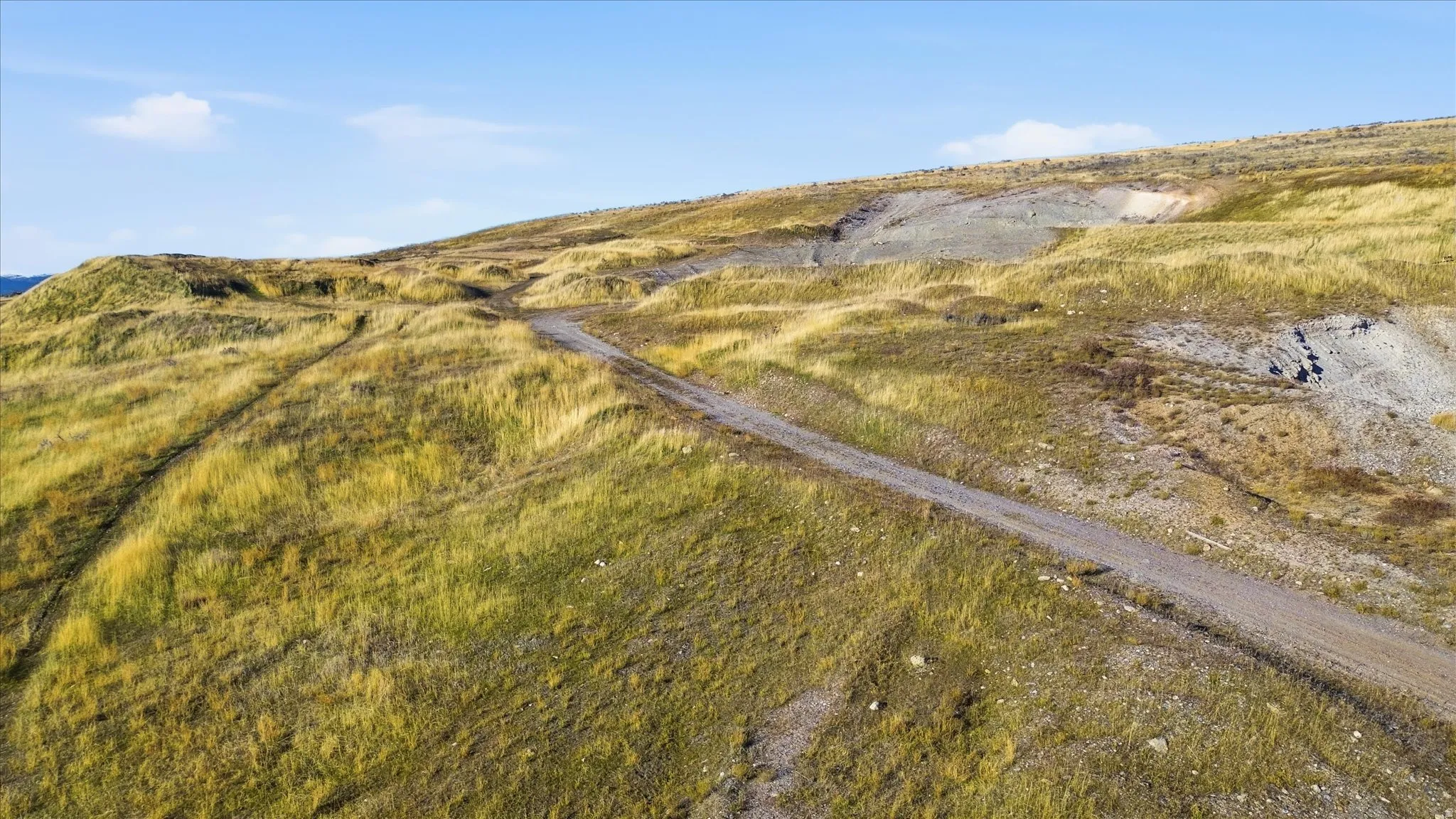 Aerial view of property and surrounding area featuring rural landscape