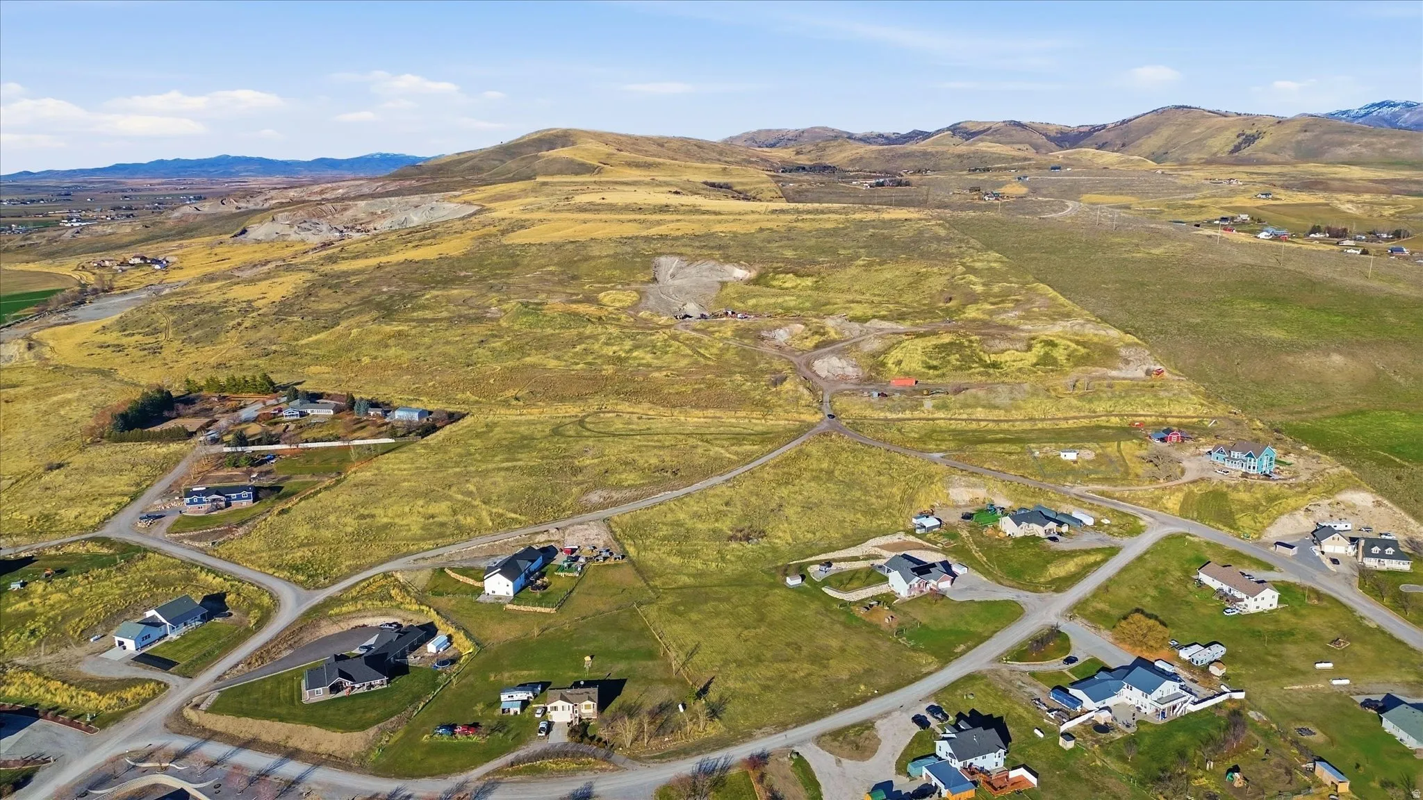 View of property location featuring a mountain backdrop and rural landscape