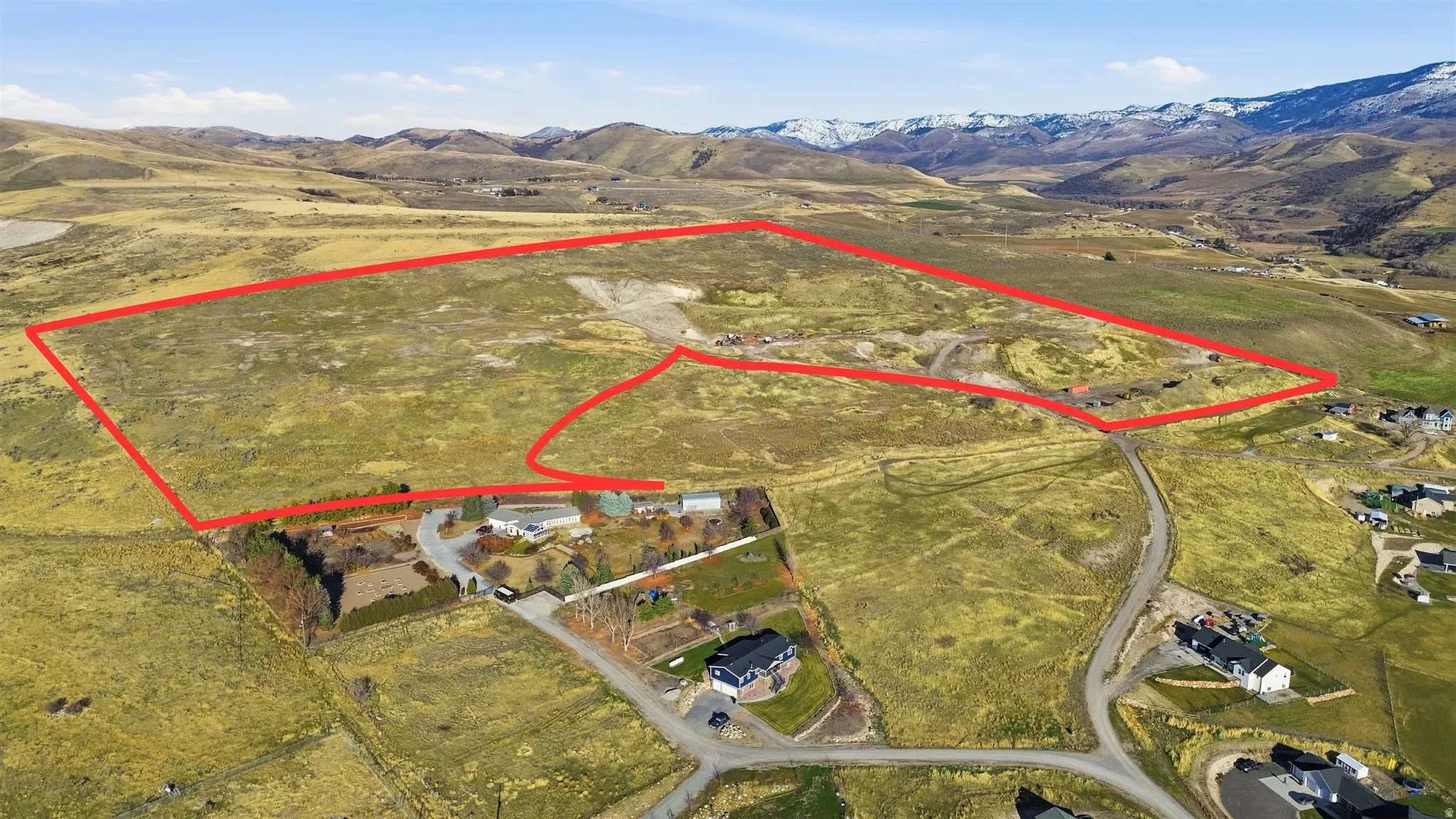 View of property location featuring mountains, rural landscape, and property parcel outlined