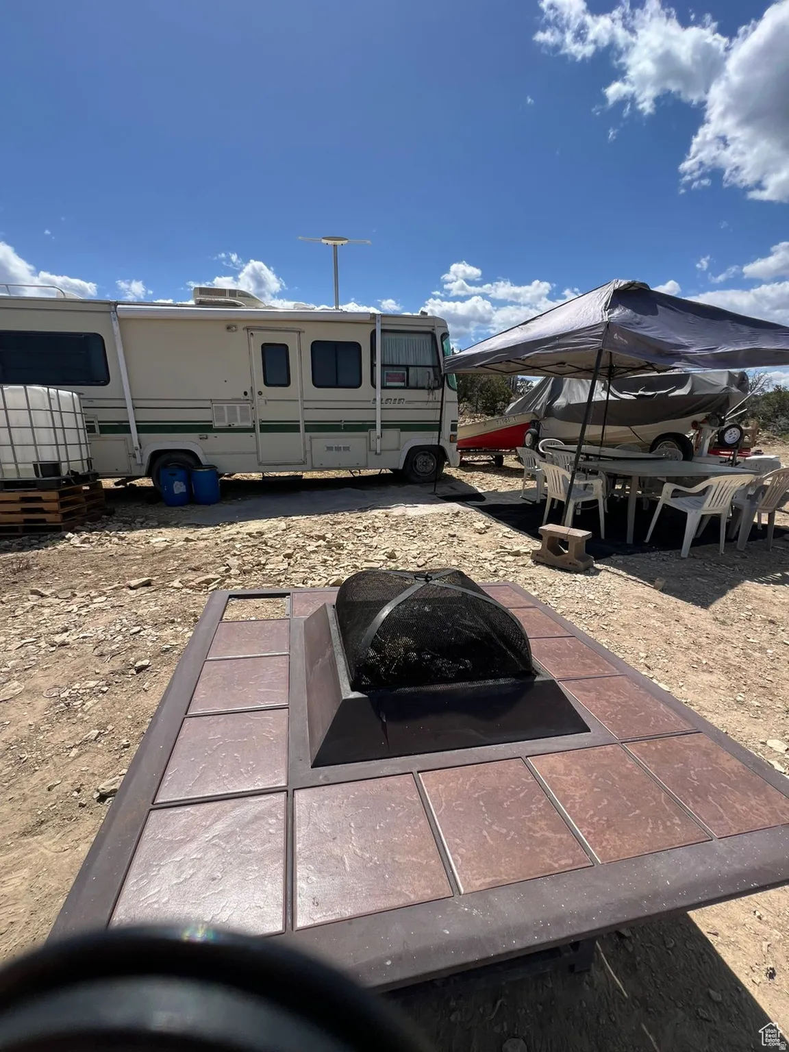View of yard with a fire pit