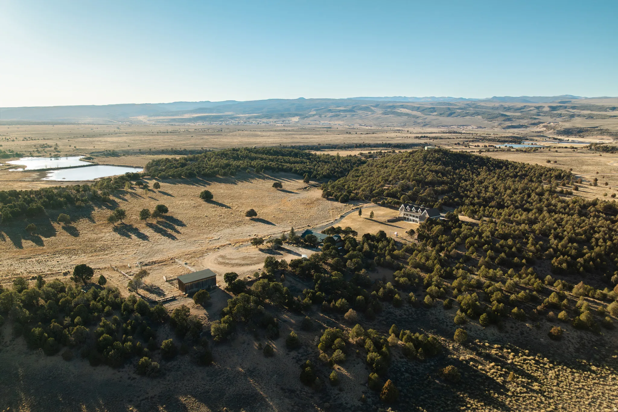 View of property location featuring a mountain backdrop and rural landscape