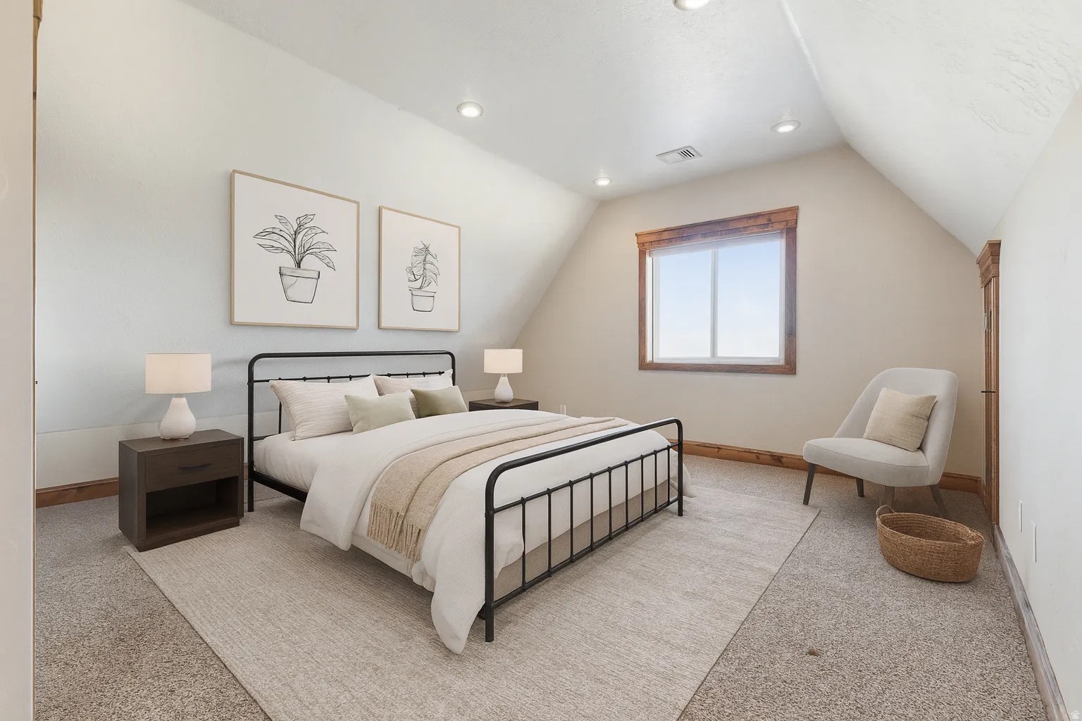 Bedroom with lofted ceiling and recessed lighting
