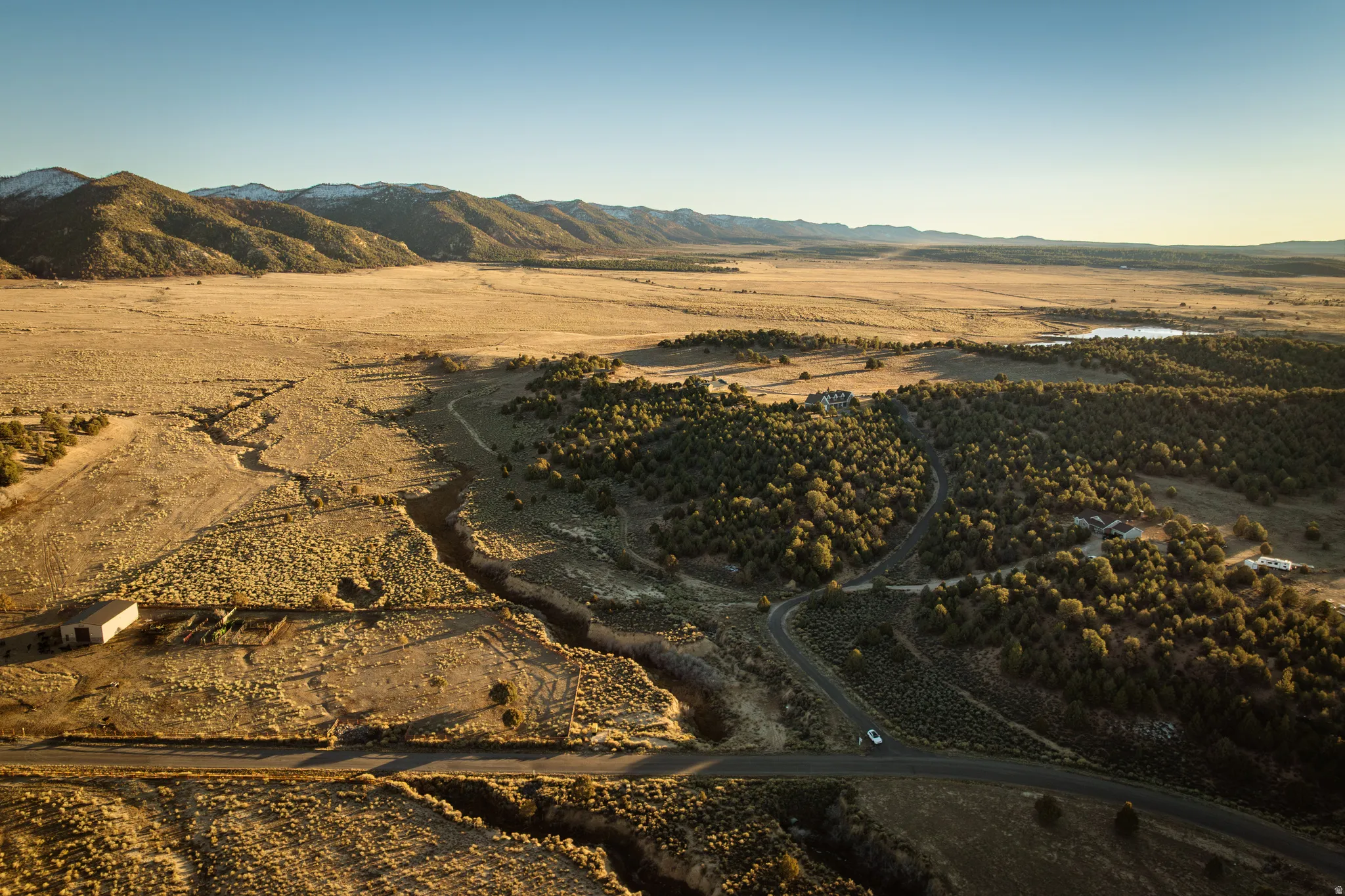 View of mountain backdrop featuring rural landscape and a desert landscape