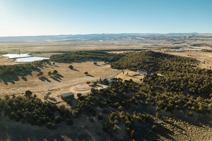 View of property location featuring a mountain backdrop and rural landscape