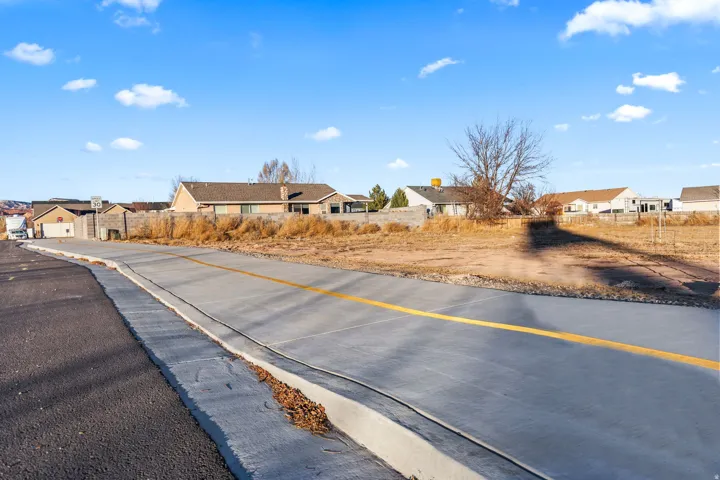 View of road featuring sidewalks and a residential view