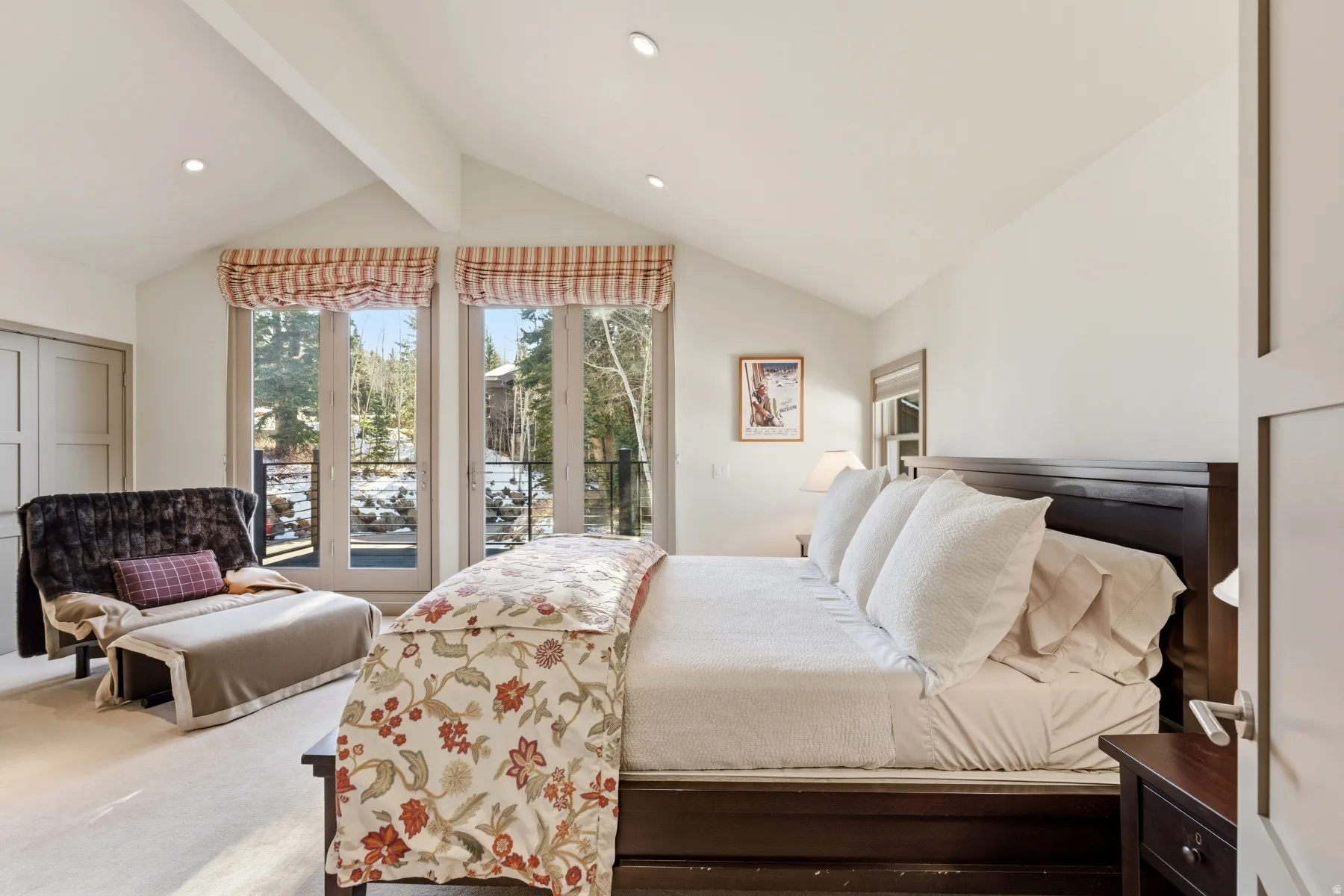 Carpeted bedroom with access to outside