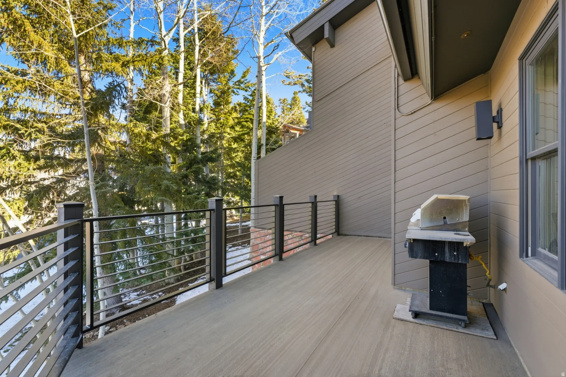 Wooden deck with area for grilling