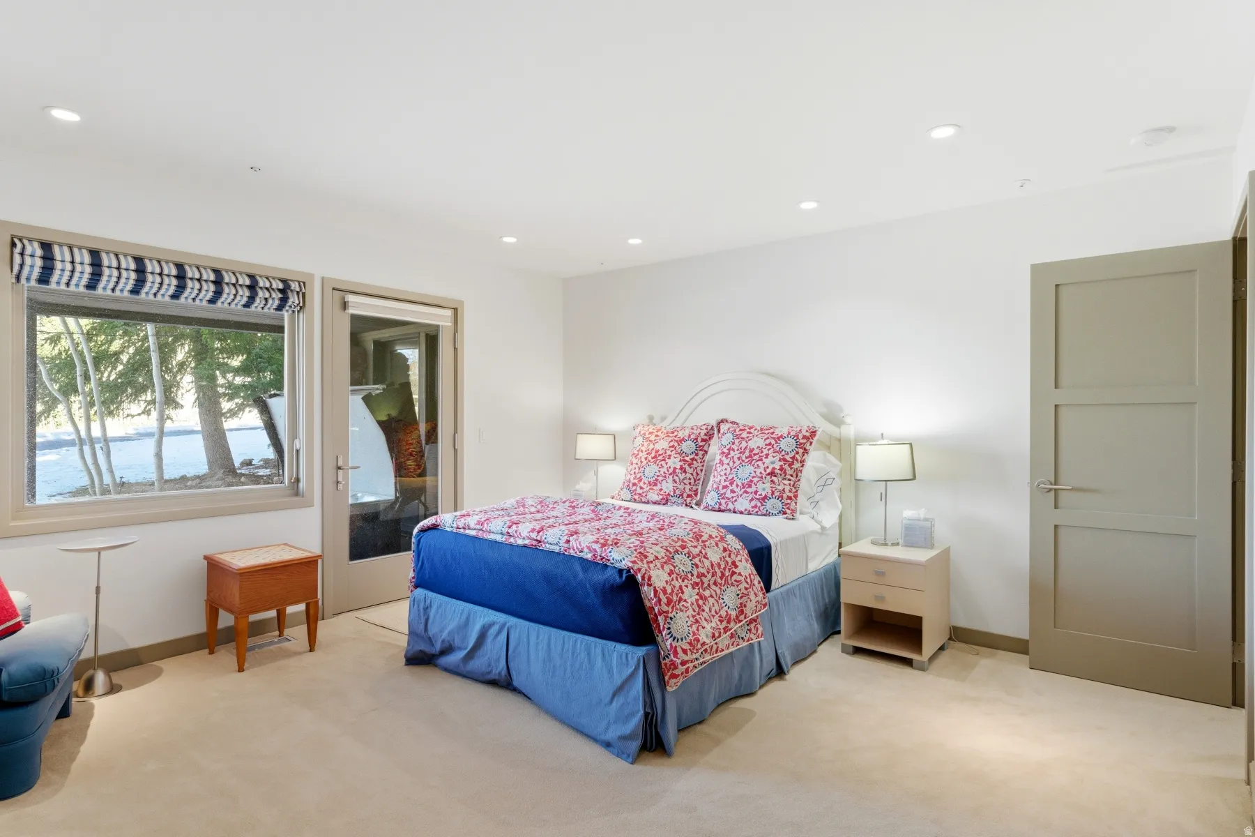 Carpeted bedroom featuring access to exterior and recessed lighting