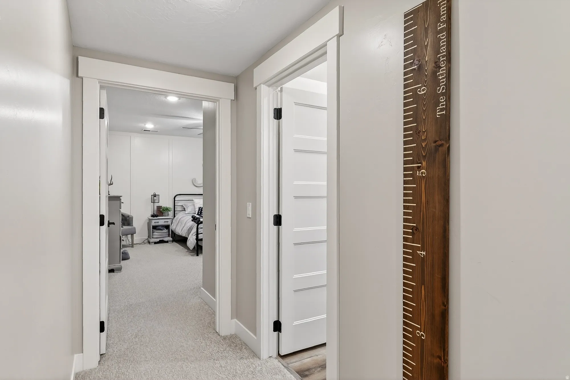 Hallway featuring baseboards