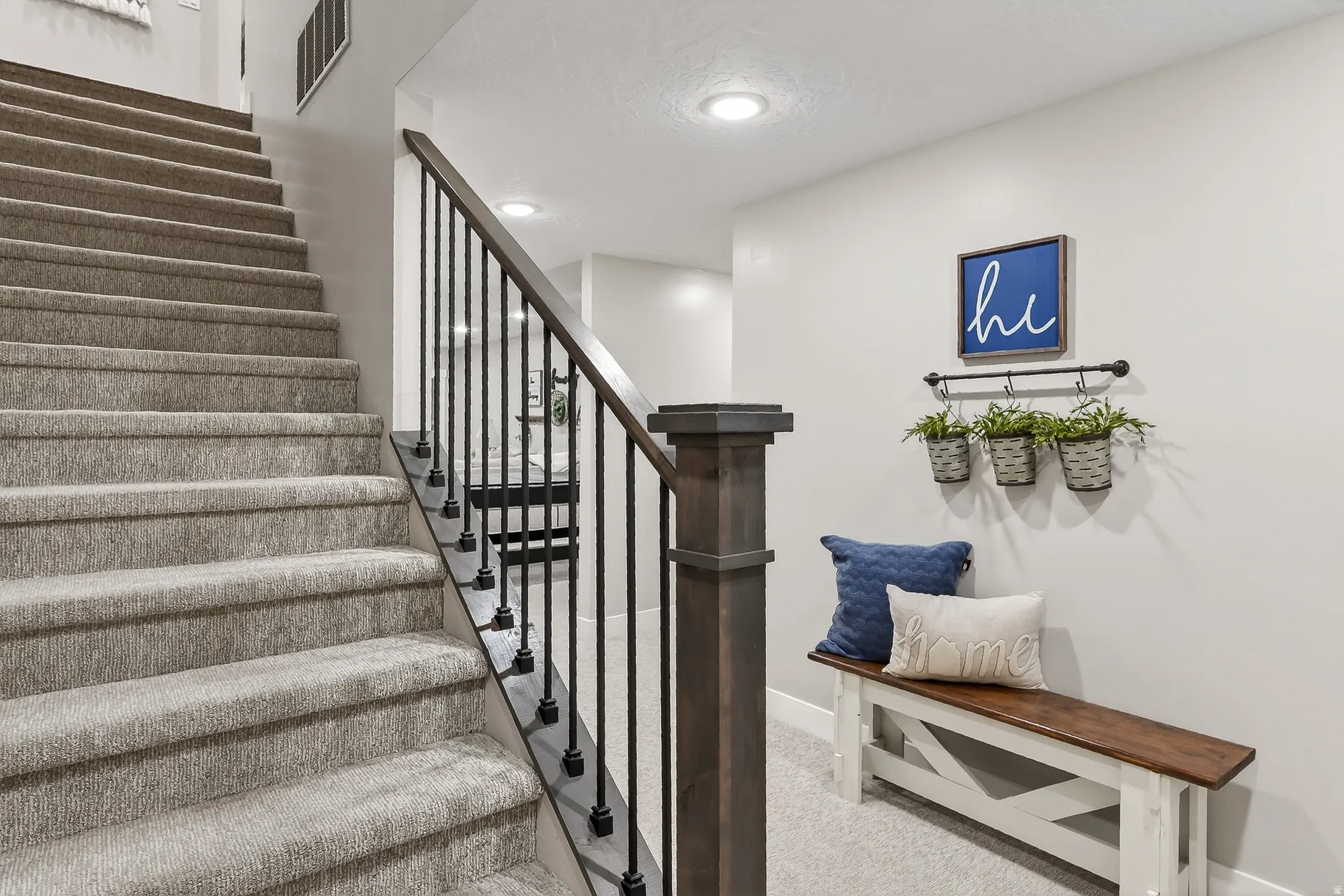 Stairs featuring carpet flooring and recessed lighting