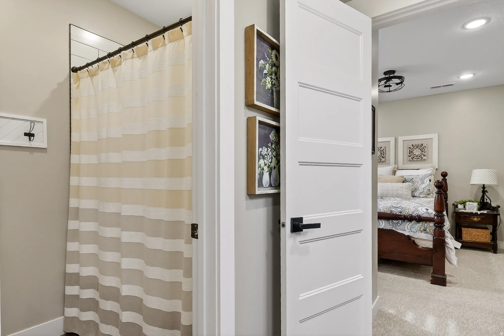 Bathroom featuring a shower with curtain, ensuite bathroom, recessed lighting, and carpet