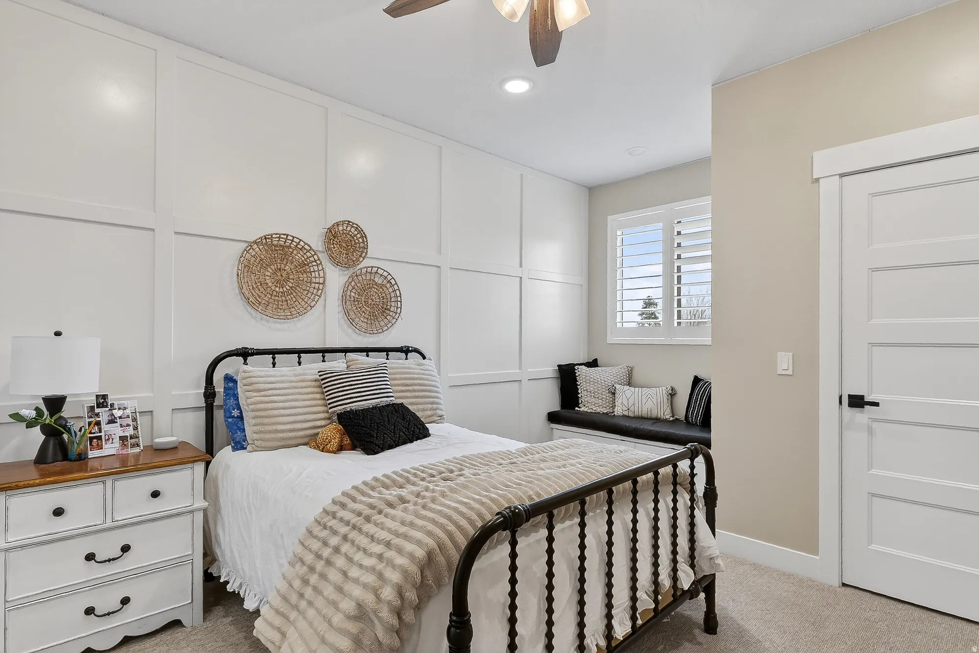 Bedroom featuring a decorative wall, light colored carpet, recessed lighting, and ceiling fan