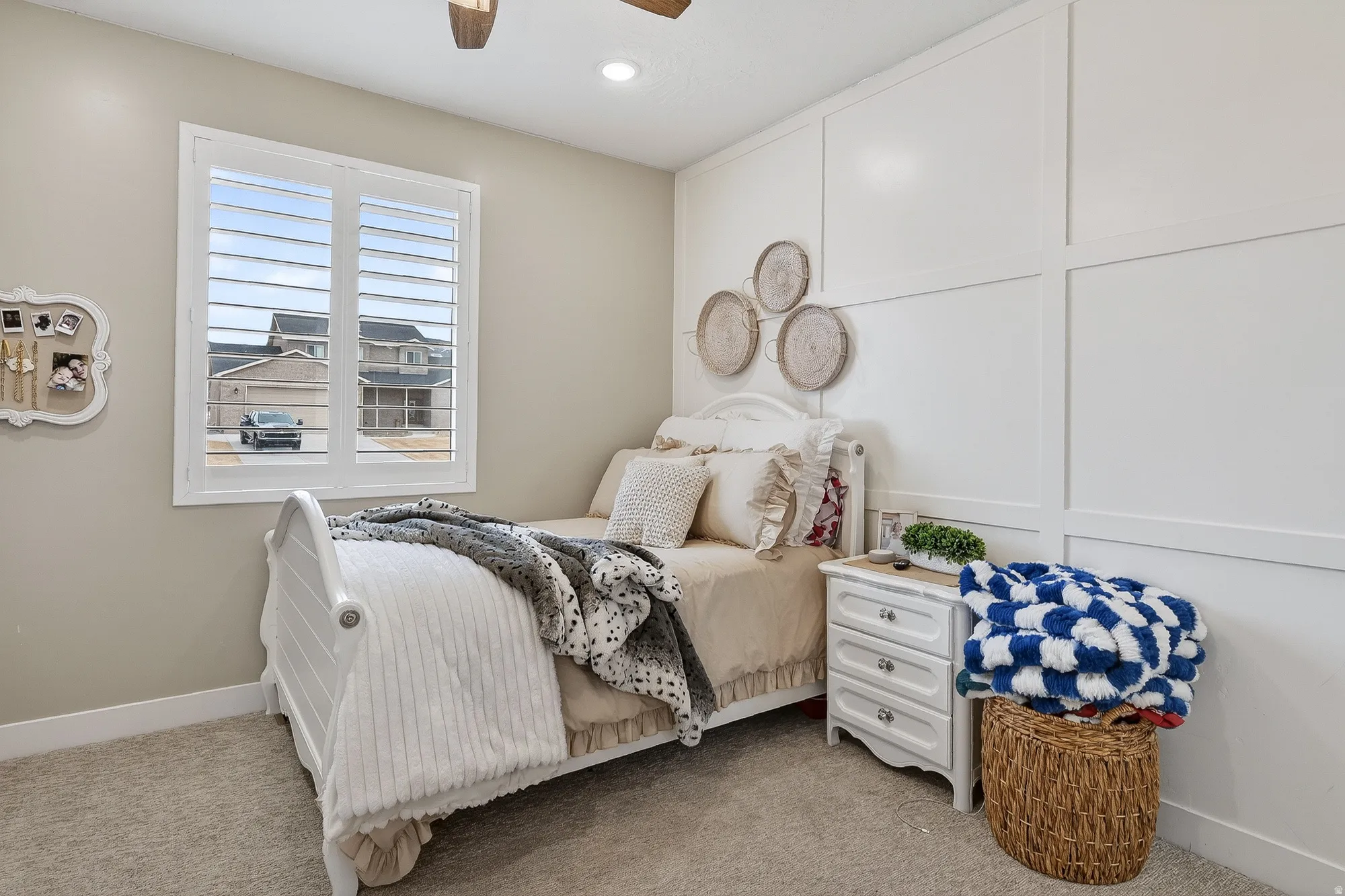 Bedroom featuring a decorative wall, carpet, a ceiling fan, and recessed lighting