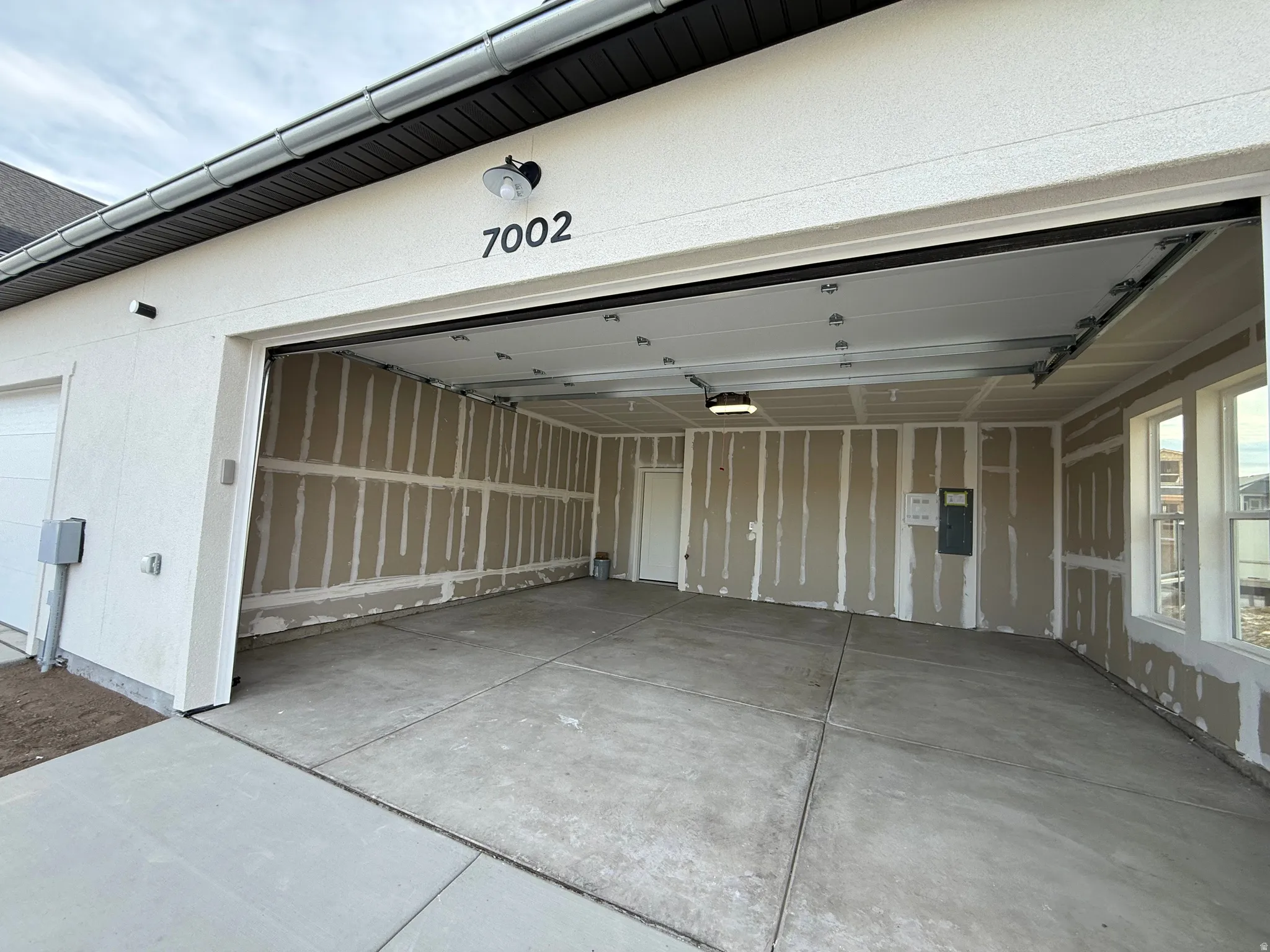 Extra wide Garage with electric panel