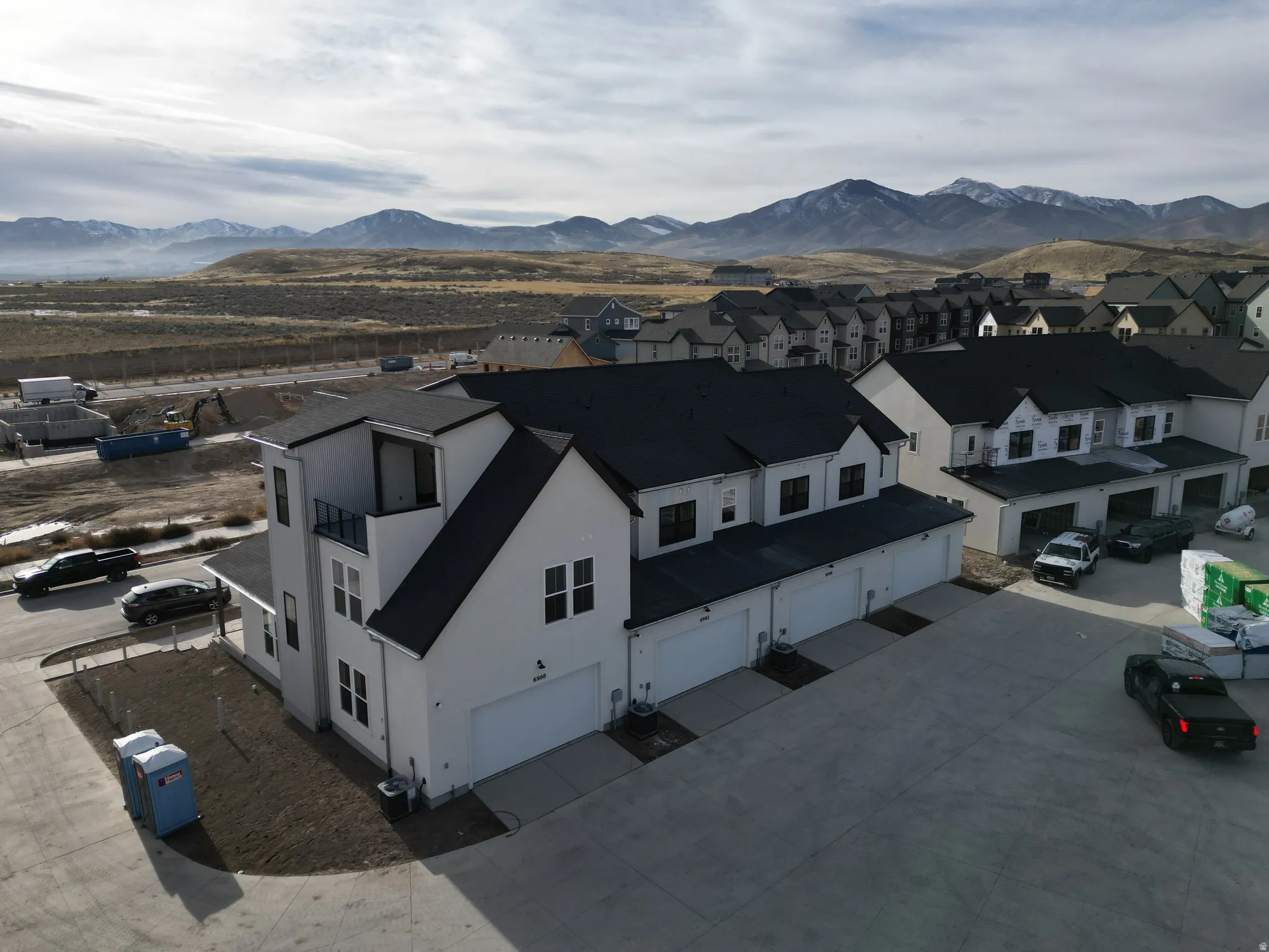 Aerial view of residential area with a mountain backdrop