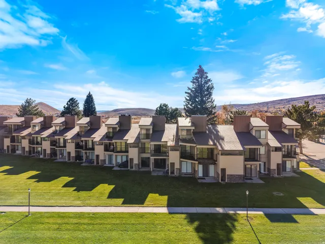 Aerial view of residential area with mountains