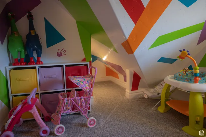 Playroom with carpet flooring and baseboards