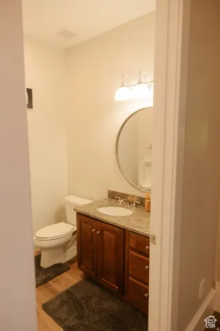 Bathroom featuring vanity and light wood-type flooring