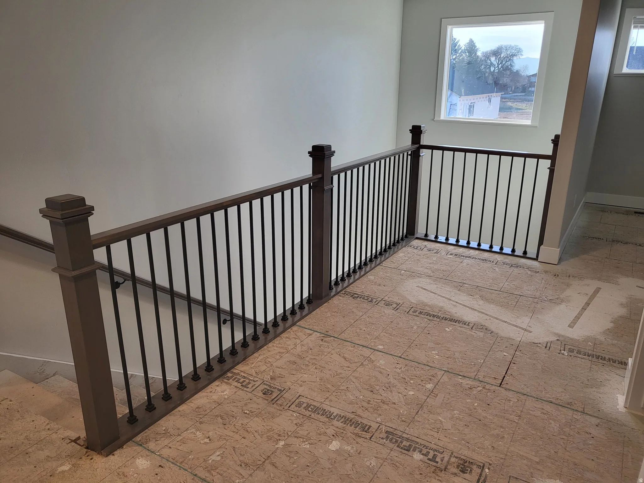 Stairway featuring baseboards