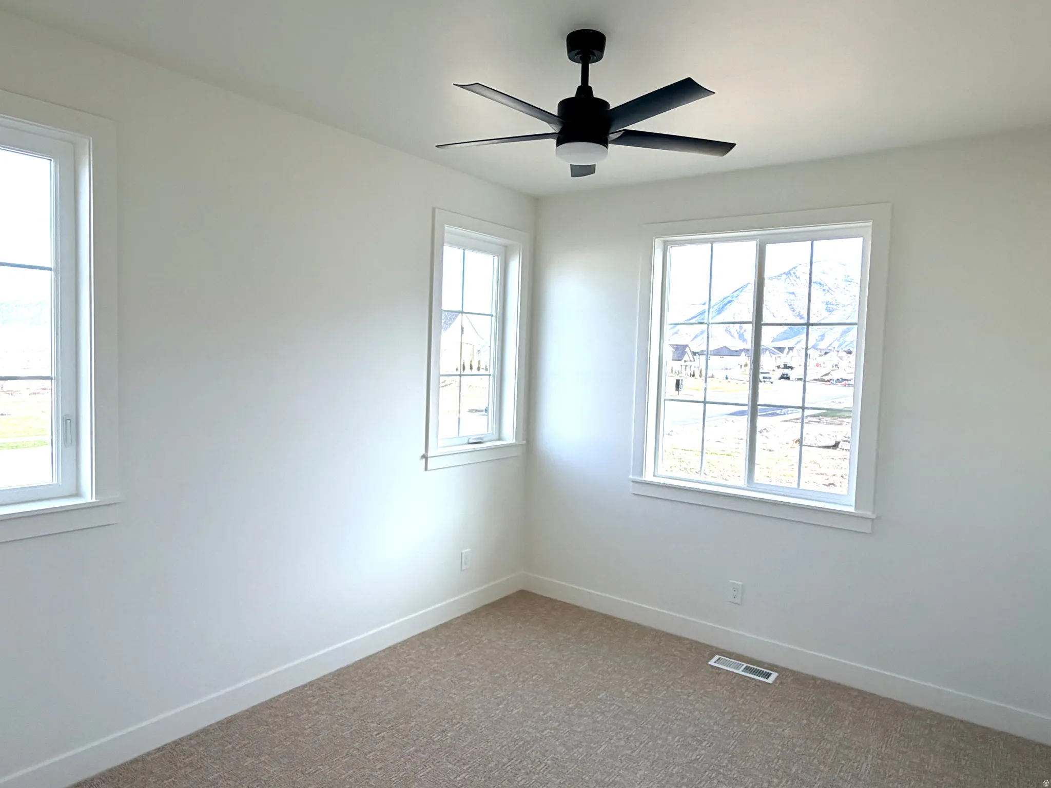 Bedroom # 3 with ceiling fan and closet