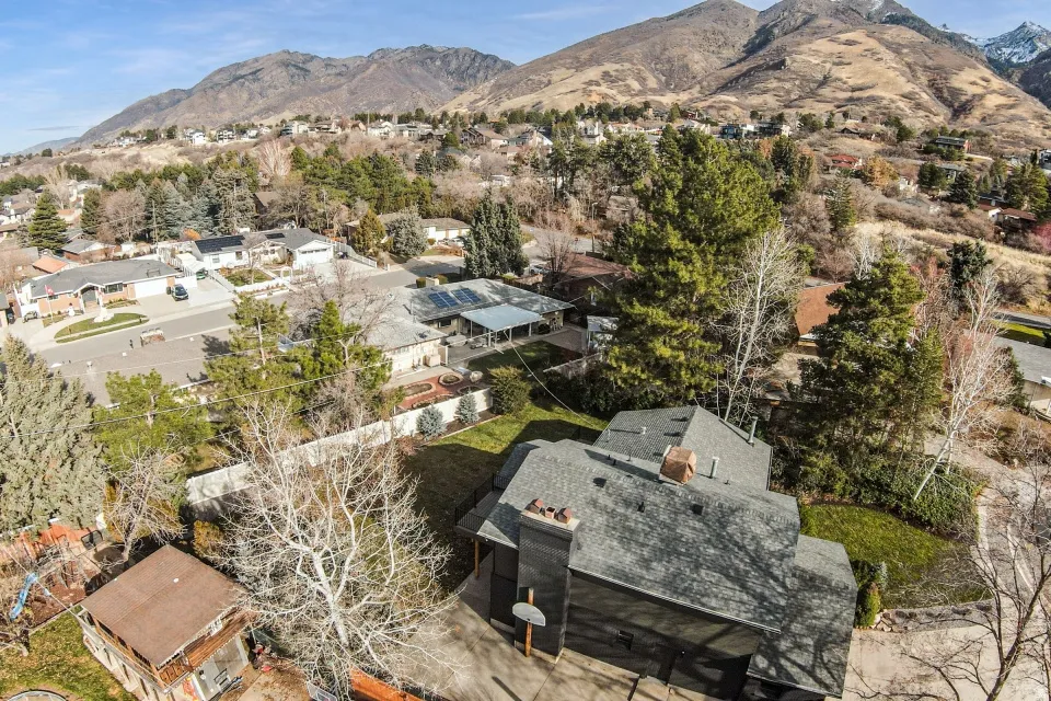 Aerial view of residential area with a mountain backdrop