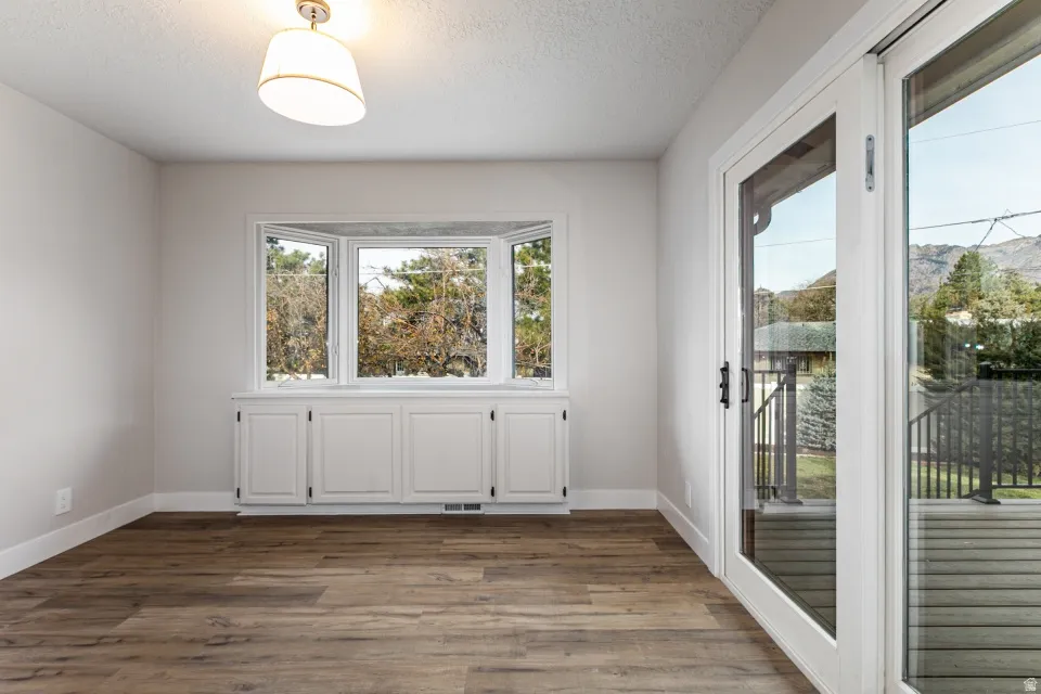 Dining nook with doors to the new deck.