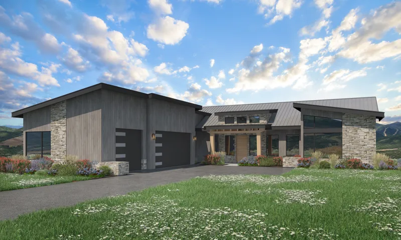 View of front of property with stone siding, a garage, a metal roof, a front lawn, and driveway