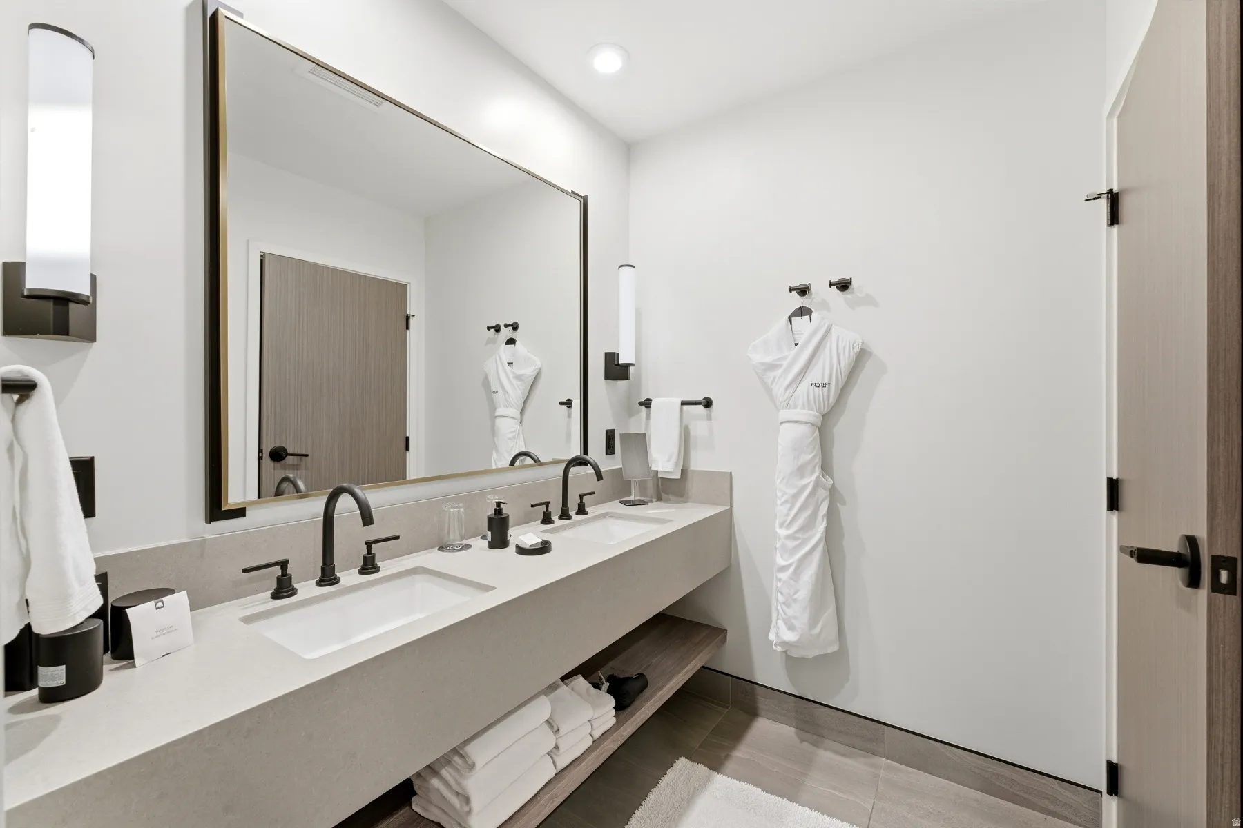 Bathroom featuring double vanity