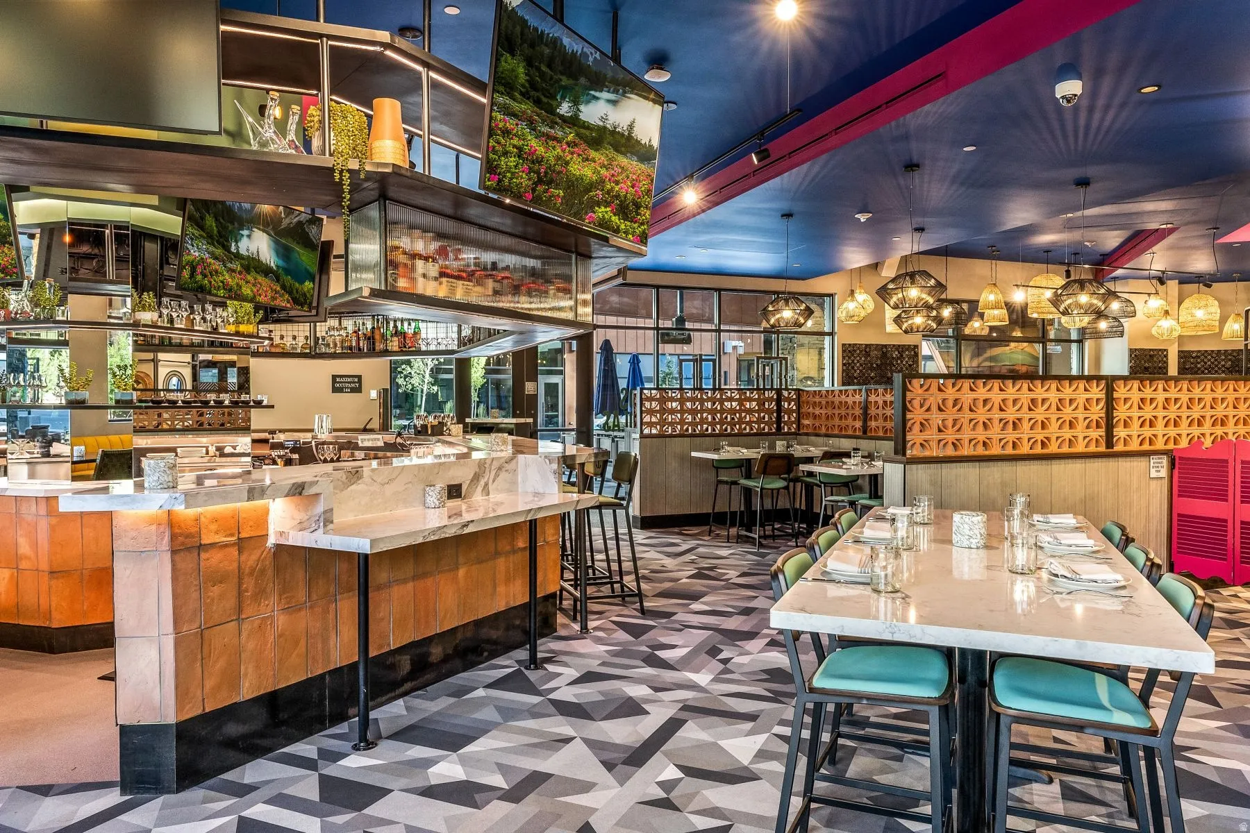 View of patio / terrace with a bar and outdoor dining area