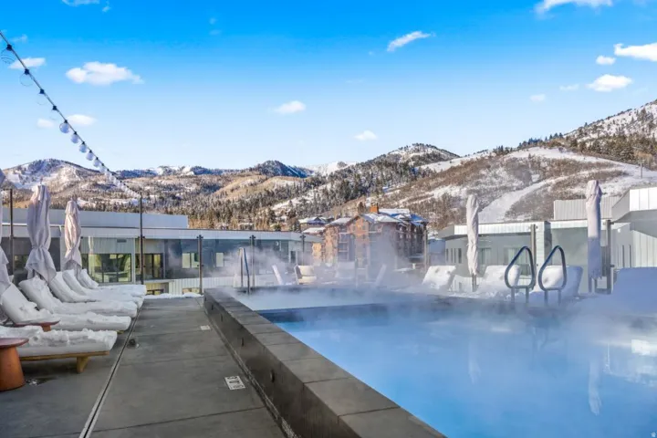 Community pool featuring a mountain view