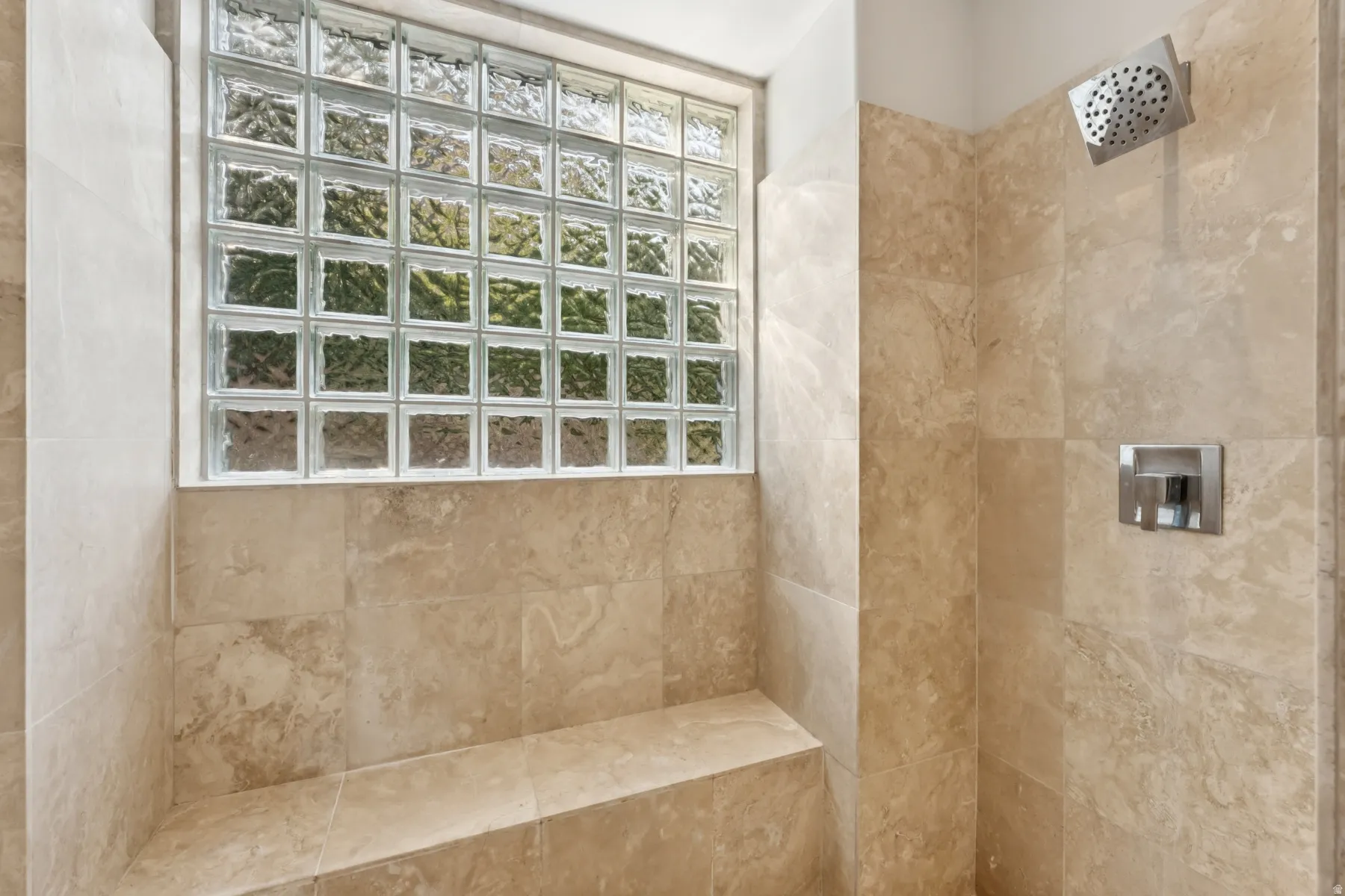 Bathroom featuring tiled shower