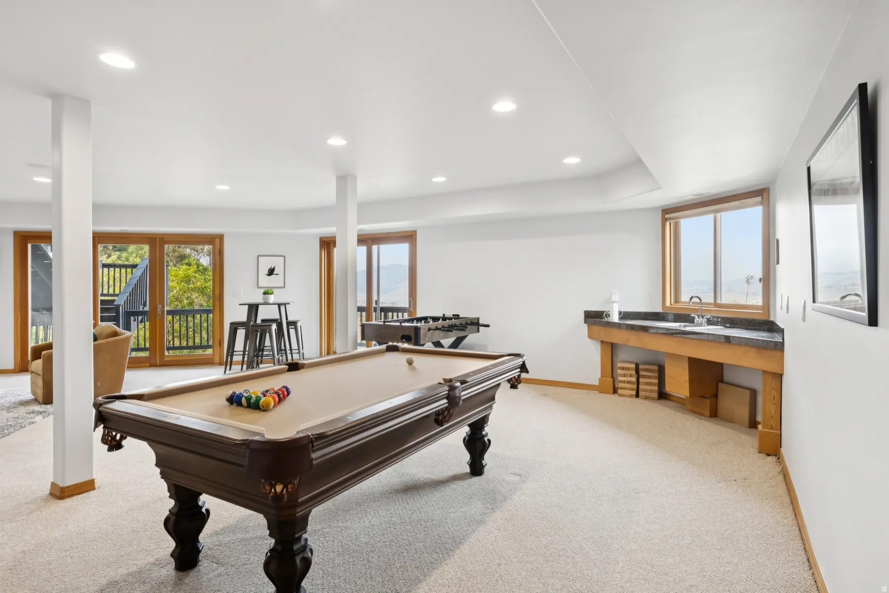 Playroom with light carpet, recessed lighting, and pool table