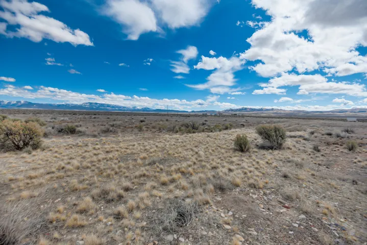 View of mountain background featuring a desert landscape and rural landscape