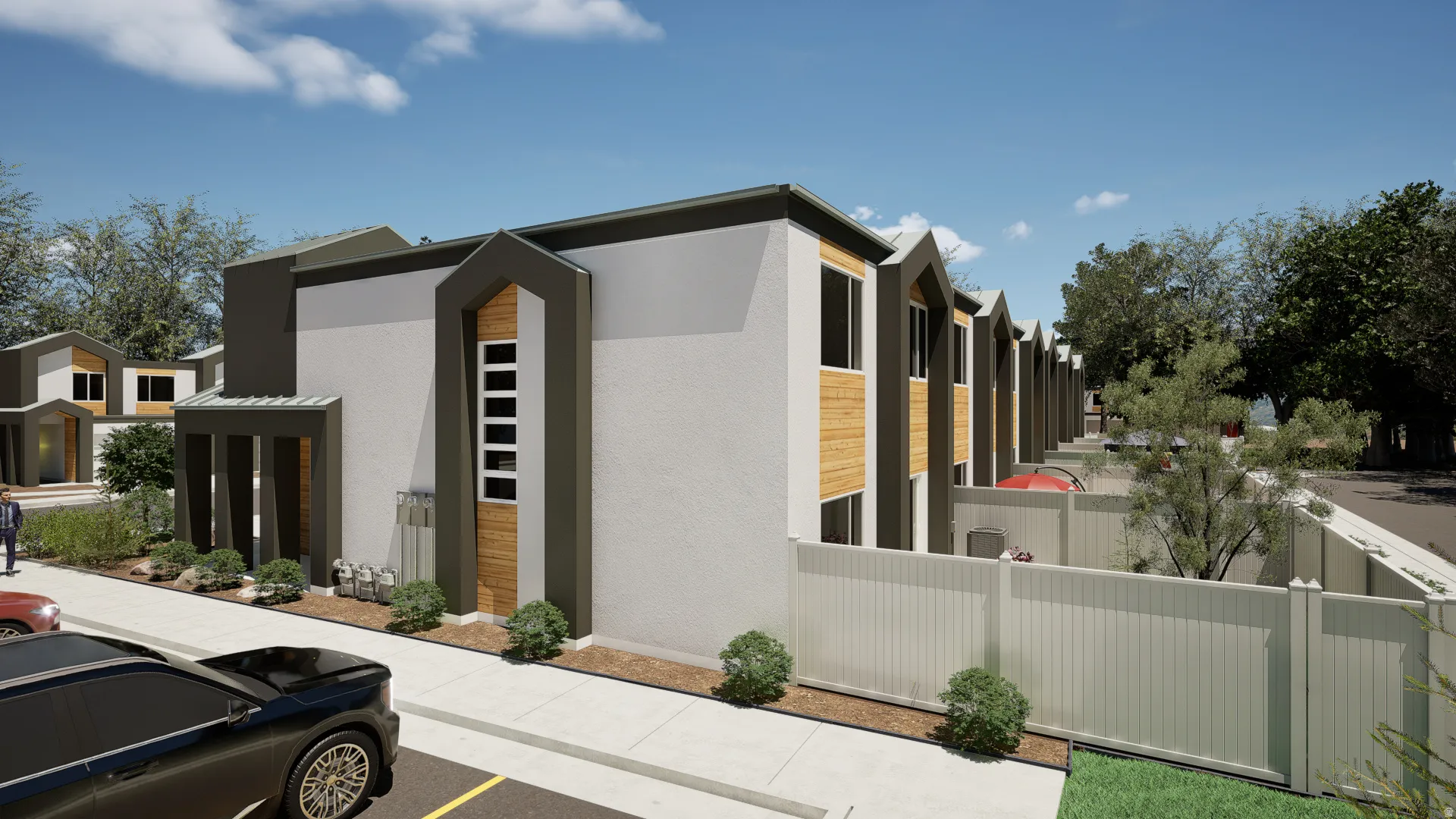 View of property exterior with stucco siding and uncovered parking