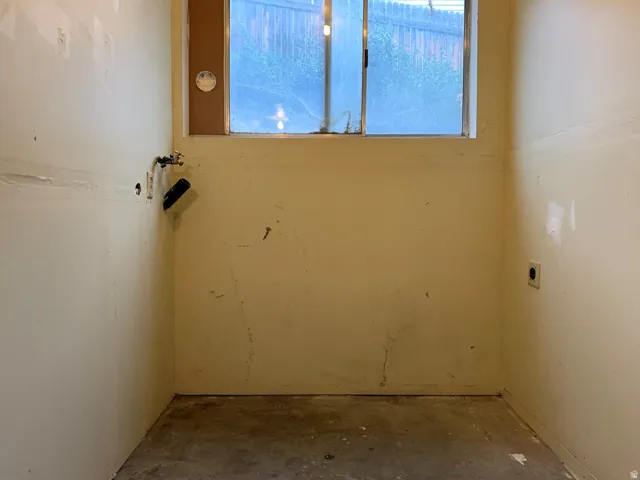 Basement featuring plenty of natural light