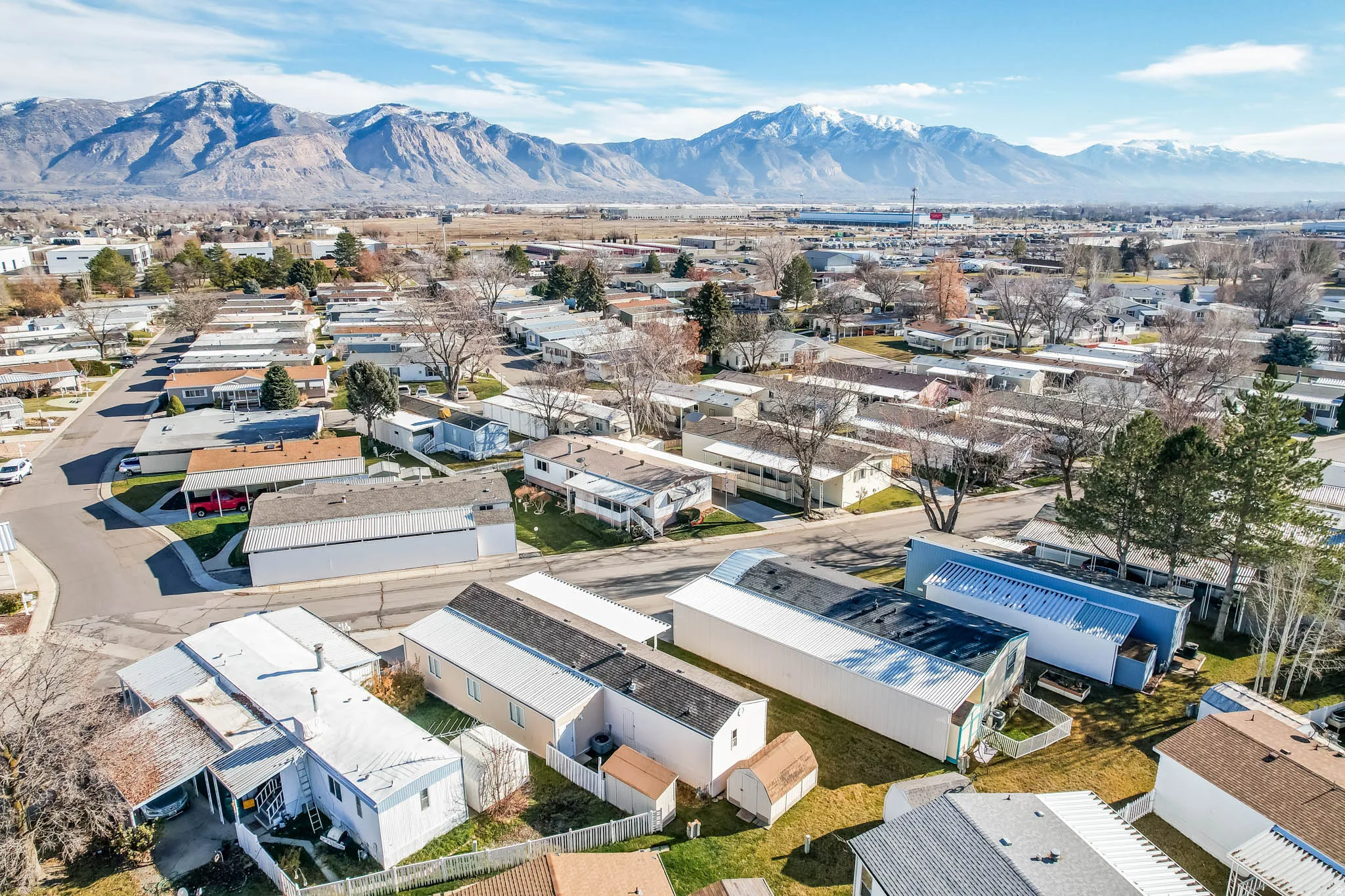 Aerial view of residential area featuring mountains