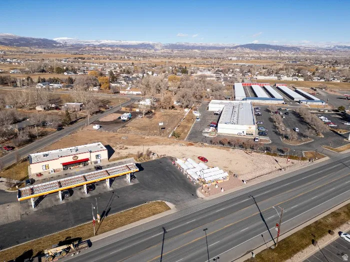 Aerial view of property's location with industrial structures