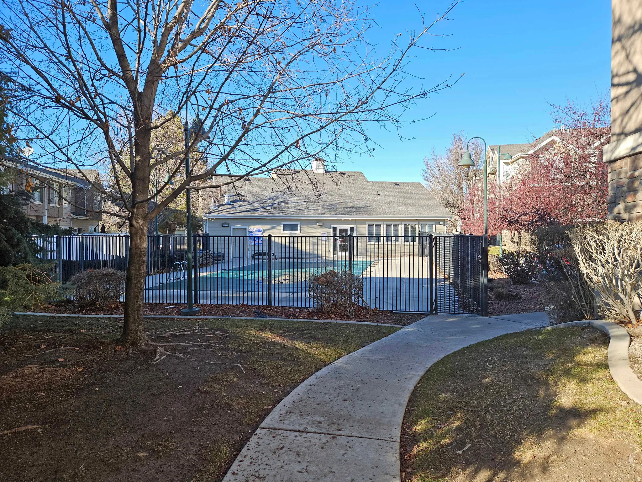 View of property's community featuring a swimming pool