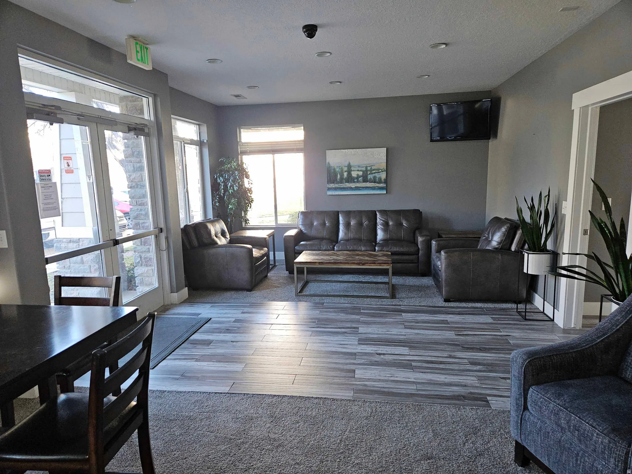 Living room featuring wood finished floors and baseboards