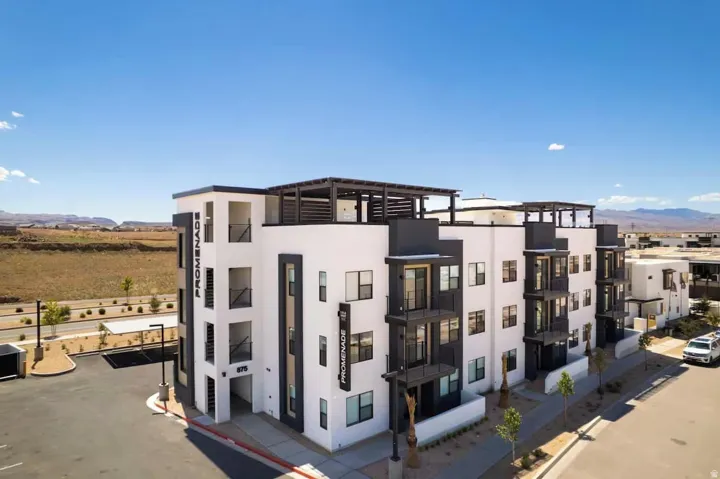 View of apartment building / complex featuring a mountain view