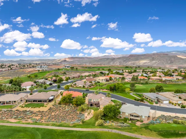 Aerial view of residential area with a mountain backdrop