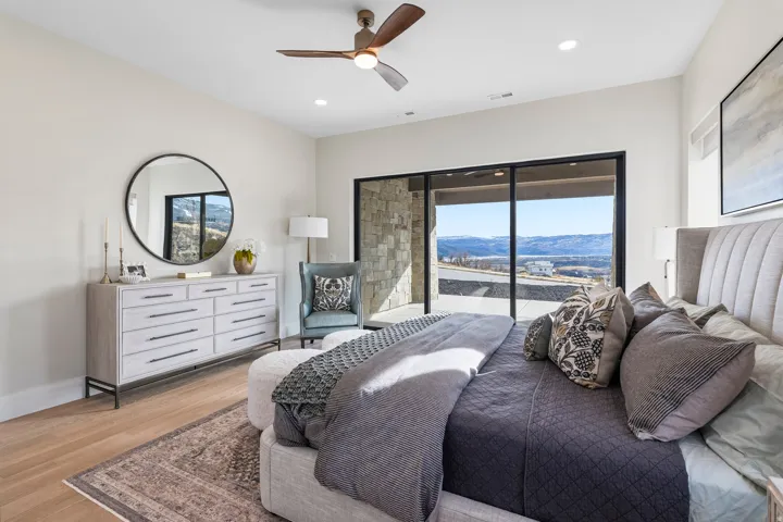 Bedroom with access to outside, wood finished floors, ceiling fan, and recessed lighting